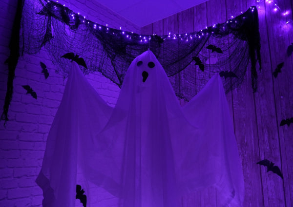 Design Your Own Halloween Ghost Scene with Haunting Purple Lights