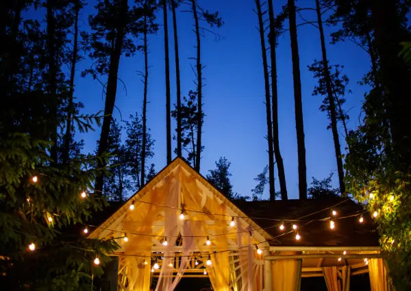 How to Hang String Lights in Your Backyard Without Trees