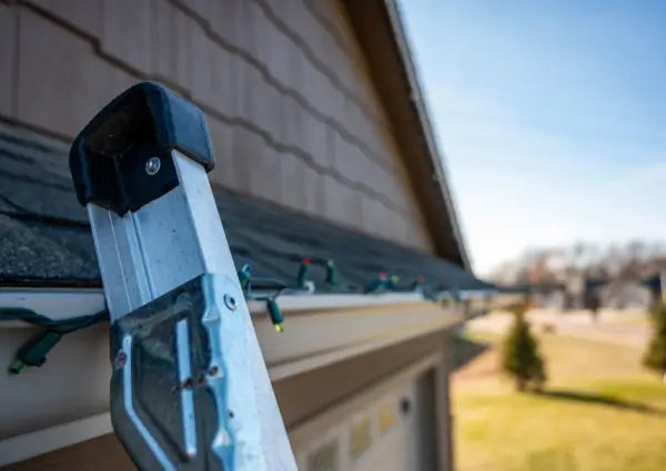 How to Hang Christmas Lights on Your Roof Without a Ladder