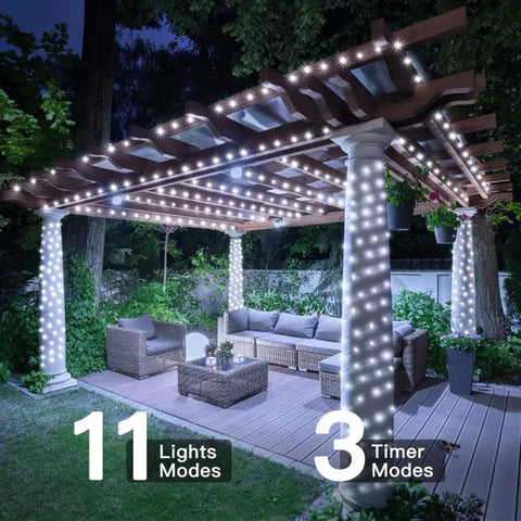 Ollny's 900 leds cool white Christmas lights with 8 lighting modes and 3 timer function
